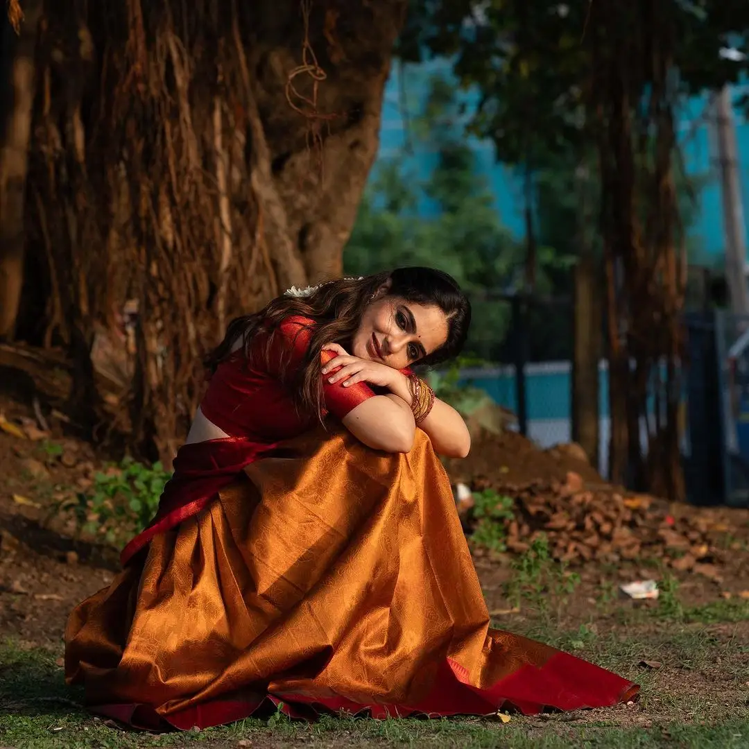 Malvi Malhotra Stills in Orange Lehenga Red Choli Maroon Voni